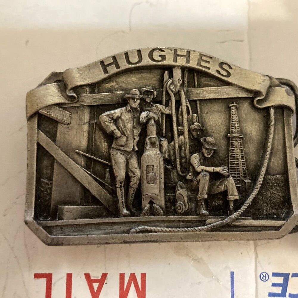 Hughes tool buckle